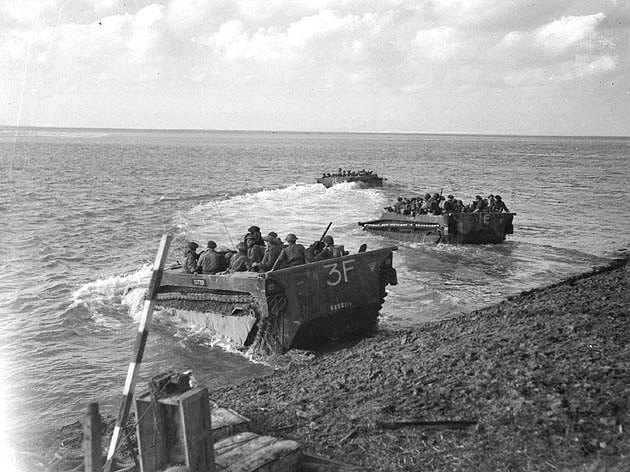 Amphibious Buffalo vehicles carrying troops across the Scheldt in 1944